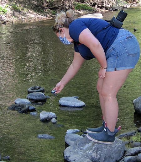 Lauren Pickford checks the temperature in Bond Brook.