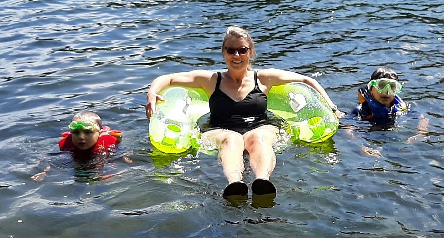 Sam (right) and Henry Walsh cool off in Long Pond with their Aunt Sarah Toner.
