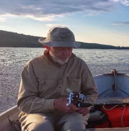 The late Alan Charles on Great Pond.