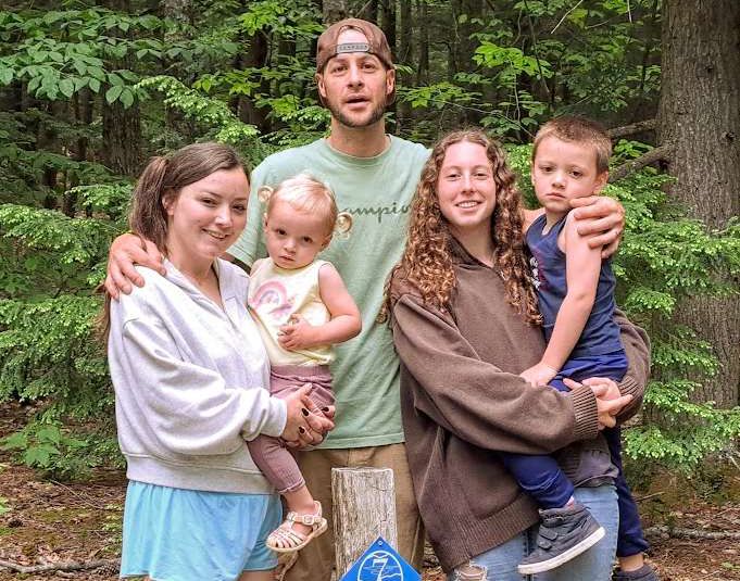 The Creamer family: Zach (back), Delylah (holding Mildred), and Adrianna (holding Zach Jr.)