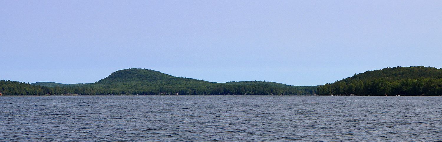 Mt. Phillip, as seen from Great Pond. Mt. Phillip is the hump left of center; on the right are Chute Island and Jamaica Point.